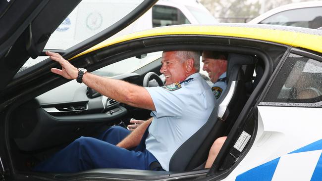 Superintendent Dave Swilks is driven away on his final day. Picture: Peter Clark