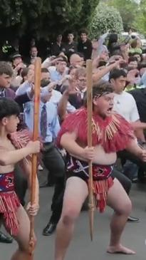 Emotional scenes as students perform haka at teacher's funeral