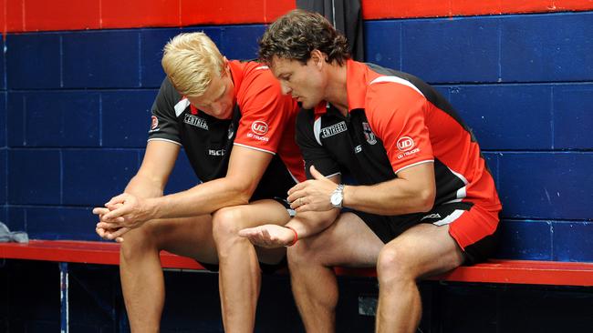 St.Kilda community camp at the Bairnsdale football club for a media conference. Captain Nick Riewoldt listens closely to coach Scott Watters after it took place. They were in deep converstaion for a few minutes.