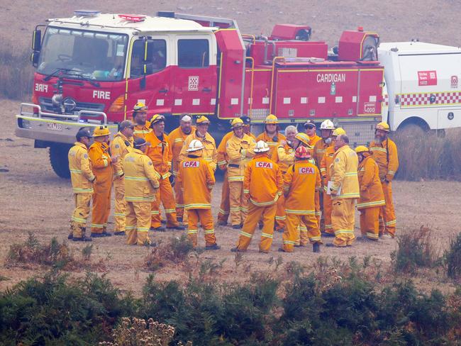 Firefighters gather on the bushfire front near Elmhurst. Picture: David Crosling