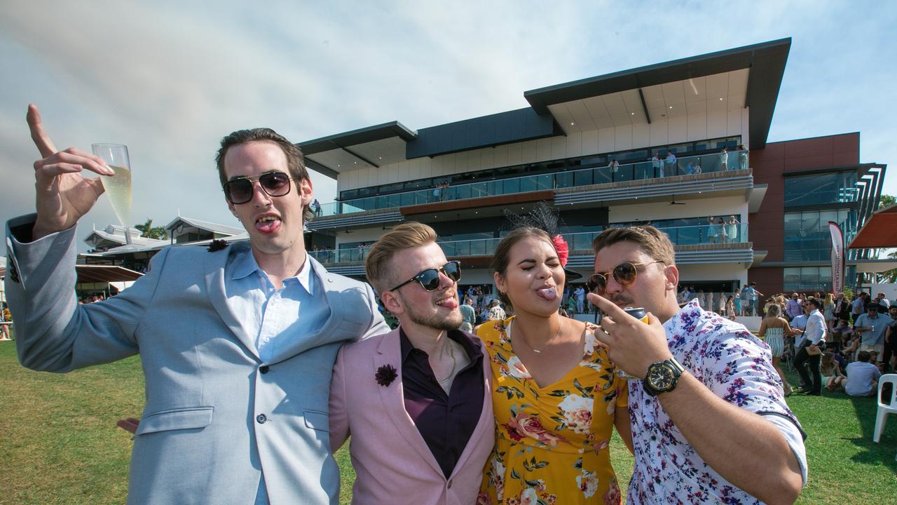 Dylan VanDerMueelen, Aaron and Keira Radovic and Hercules Schutte as punters enjoy the Great Northern Darwin Cup Picture: GLENN CAMPBELL