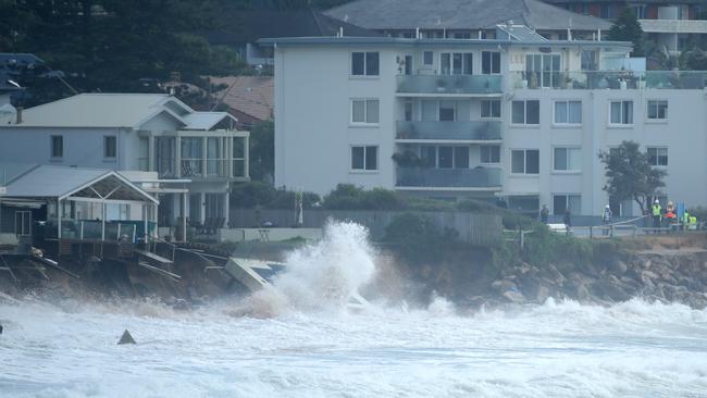 The king tide continued to batter homes along the beachfront this morning.