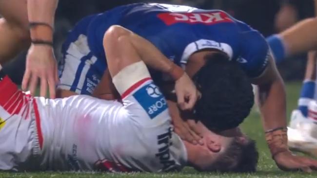 Crichton rubs his face on Flanagan's, pressing his nose against his mouth.