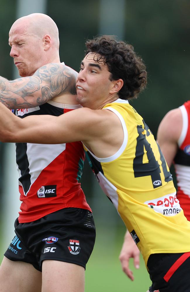 Jack Bell (right) on the training track with the Saints.