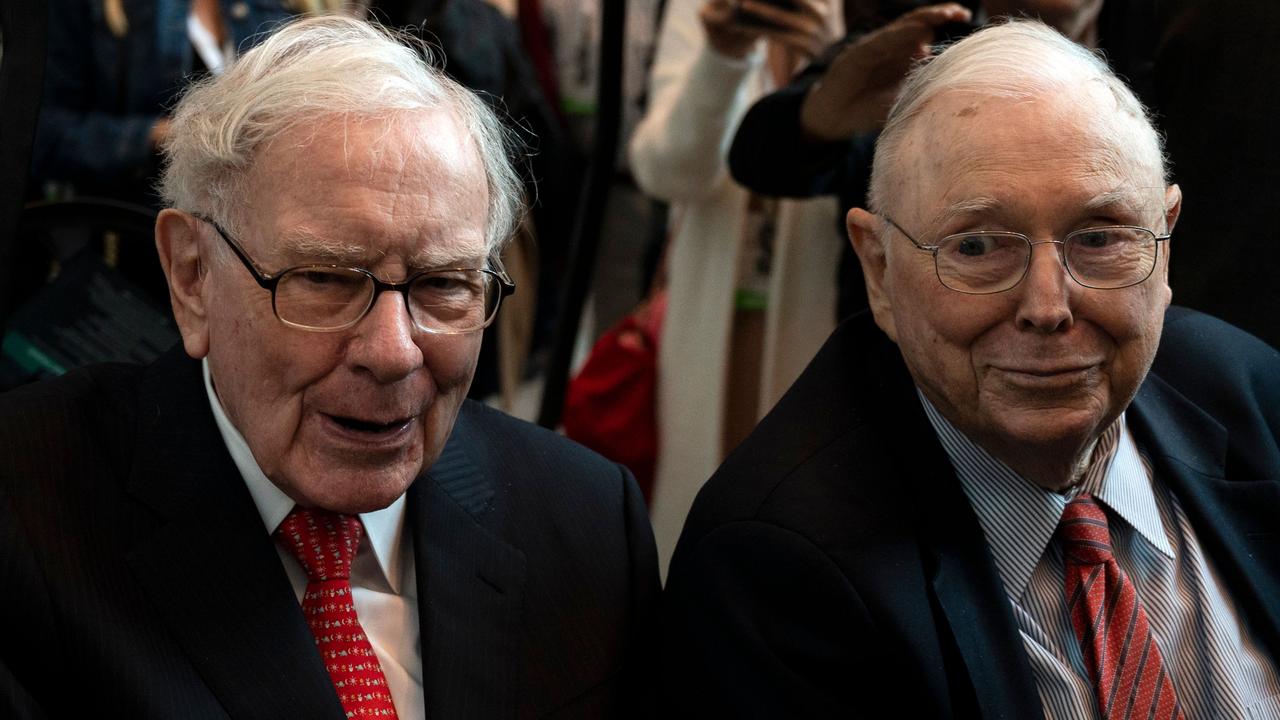 Charlie Munger (right) pictured with Warren Buffett, described cryptocurrencies as a ‘venereal disease’. Picture: Johannes Eisele/AFP