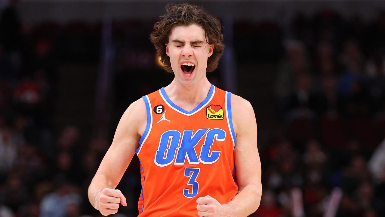 CHICAGO, ILLINOIS - JANUARY 13: Josh Giddey #3 of the Oklahoma City Thunder celebrates a basket by Kenrich Williams #34 (not pictured) against the Chicago Bulls during the second half at United Center on January 13, 2023 in Chicago, Illinois. NOTE TO USER: User expressly acknowledges and agrees that, by downloading and or using this photograph, User is consenting to the terms and conditions of the Getty Images License Agreement. Michael Reaves/Getty Images/AFP (Photo by Michael Reaves / GETTY IMAGES NORTH AMERICA / Getty Images via AFP)