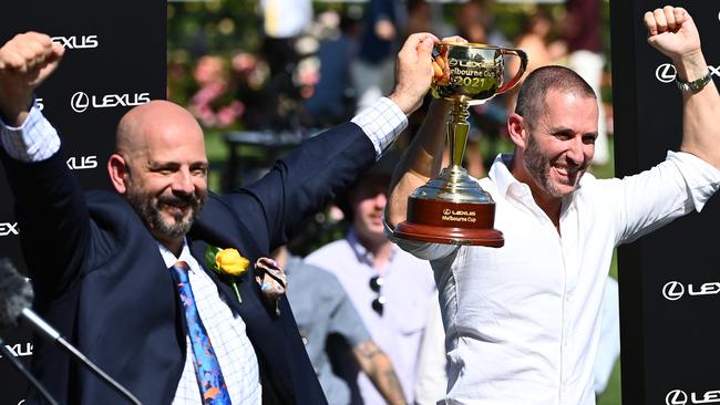 Ozzie Kheir with the Melbourne Cup after Verry Elleegant’s victory. Picture: Getty Images