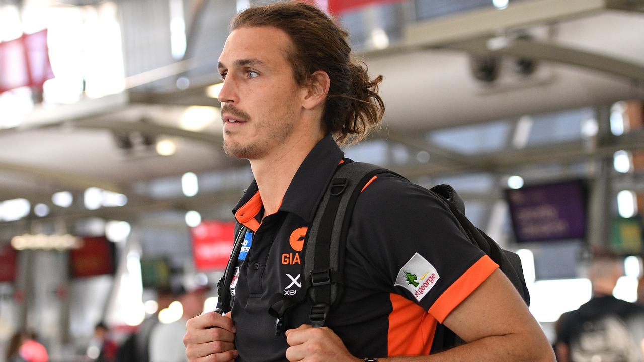 Giants players had to go home from Sydney airport due to Queensland border rules.