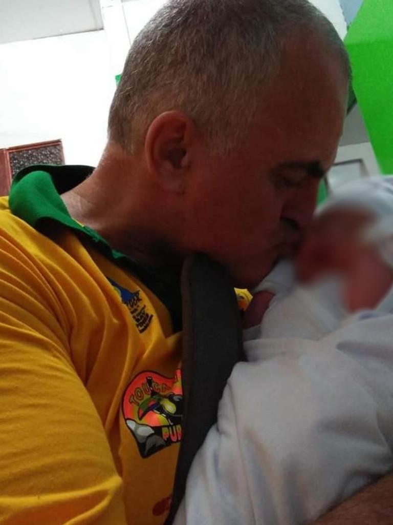 Former Sydney police office Jamie Flanagan (pictured with his newborn baby daughter. Picture: Supplied