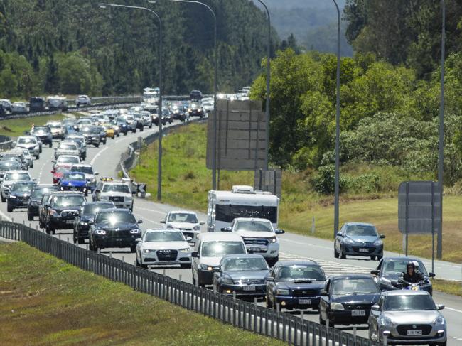South bound traffic on the Bruce Highway comes to a standstill near Johnstons Road as holiday makers head home to Brisbane after the long weekend. Photo Lachie Millard