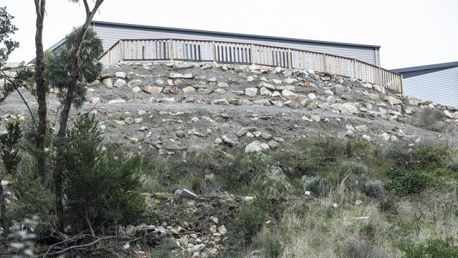 Karen Oliver lives in constant fear of a landslide wiping out her and her Abbotsfield Road unit in Claremont. Picture Eddie Safarik