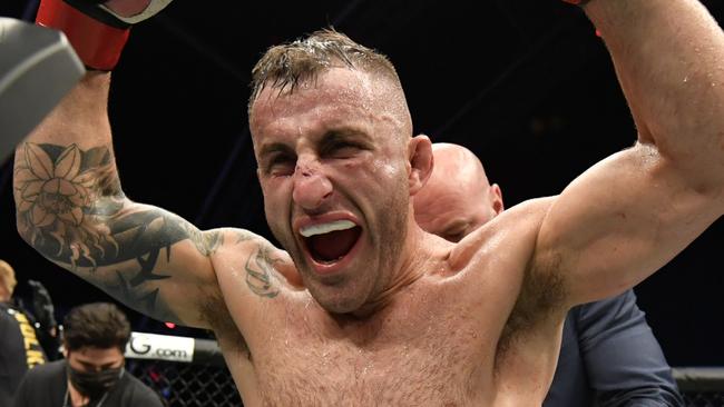 ABU DHABI, UNITED ARAB EMIRATES - JULY 12: Alexander Volkanovski of Australia celebrates after his split-decision victory over Max Holloway in their UFC featherweight championship fight during the UFC 251 event at Flash Forum on UFC Fight Island on July 12, 2020 on Yas Island, Abu Dhabi, United Arab Emirates. (Photo by Jeff Bottari/Zuffa LLC)