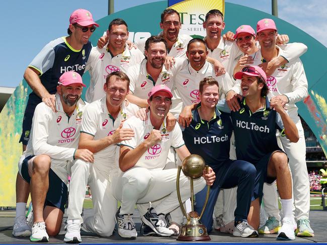 SYDNEY, AUSTRALIA - JANUARY 05: Pat Cummins of Australia celebrates with teammates after reclaiming the BorderÃ¢â¬âGavaskar Trophy on day three of the Fifth Men's Test Match in the series between Australia and India at Sydney Cricket Ground on January 05, 2025 in Sydney, Australia. (Photo by Cameron Spencer/Getty Images)