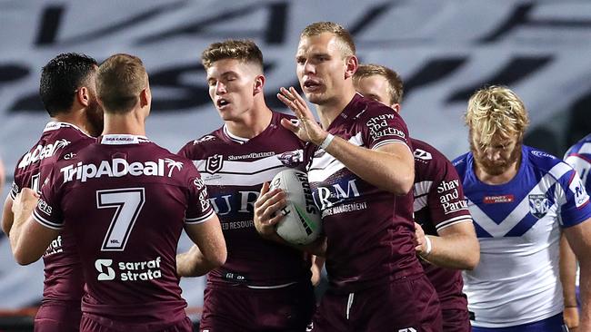 Tom Trbojevic of the Sea Eagles reacts after scoring a try.