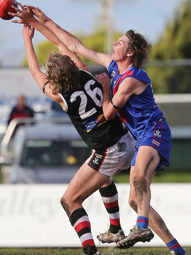 Terang-Mortlake’s Rhys Buck attempts to spoil Koroit’s Jag McInerney.