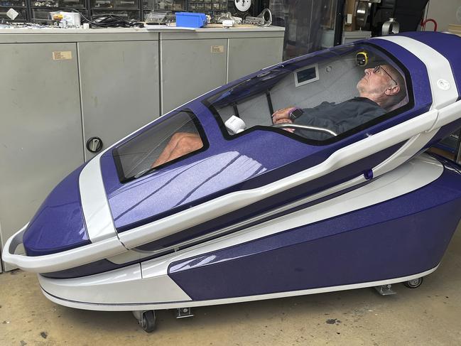 Philip Nitschke inside a 'suicide pod' known as 'The Sarco'. Picture: AP Photo/Ahmad Seir