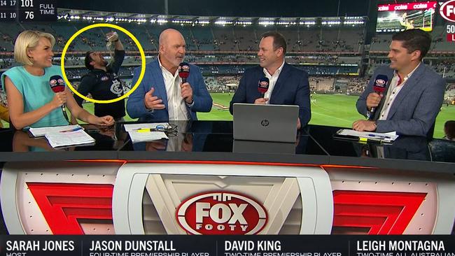 A fan snuck into the camera shot on Fox Footy. Photo: Kayo.