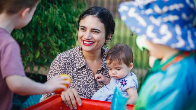 Education Minister Lauren Moss and her daughter Evelyn Lutz, eight months, at Ludmilla Primary School. Picture: Glenn Campbell