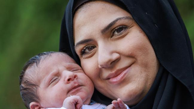 Saada Houli will allow her daughter, Mya, to take part in the Victorian government’s Gen V study. Picture: David Geraghty