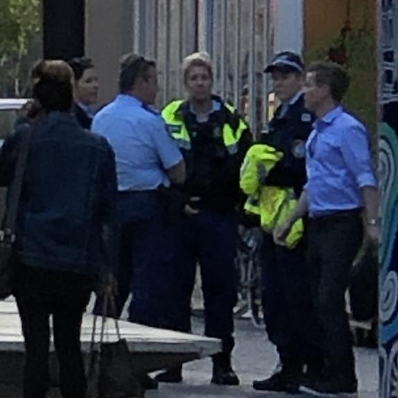 Police helped manage the evacuation of more than 100 people from the Manly National apartment complex in Manly after an early morning kitchen fire. Picture: News Corp