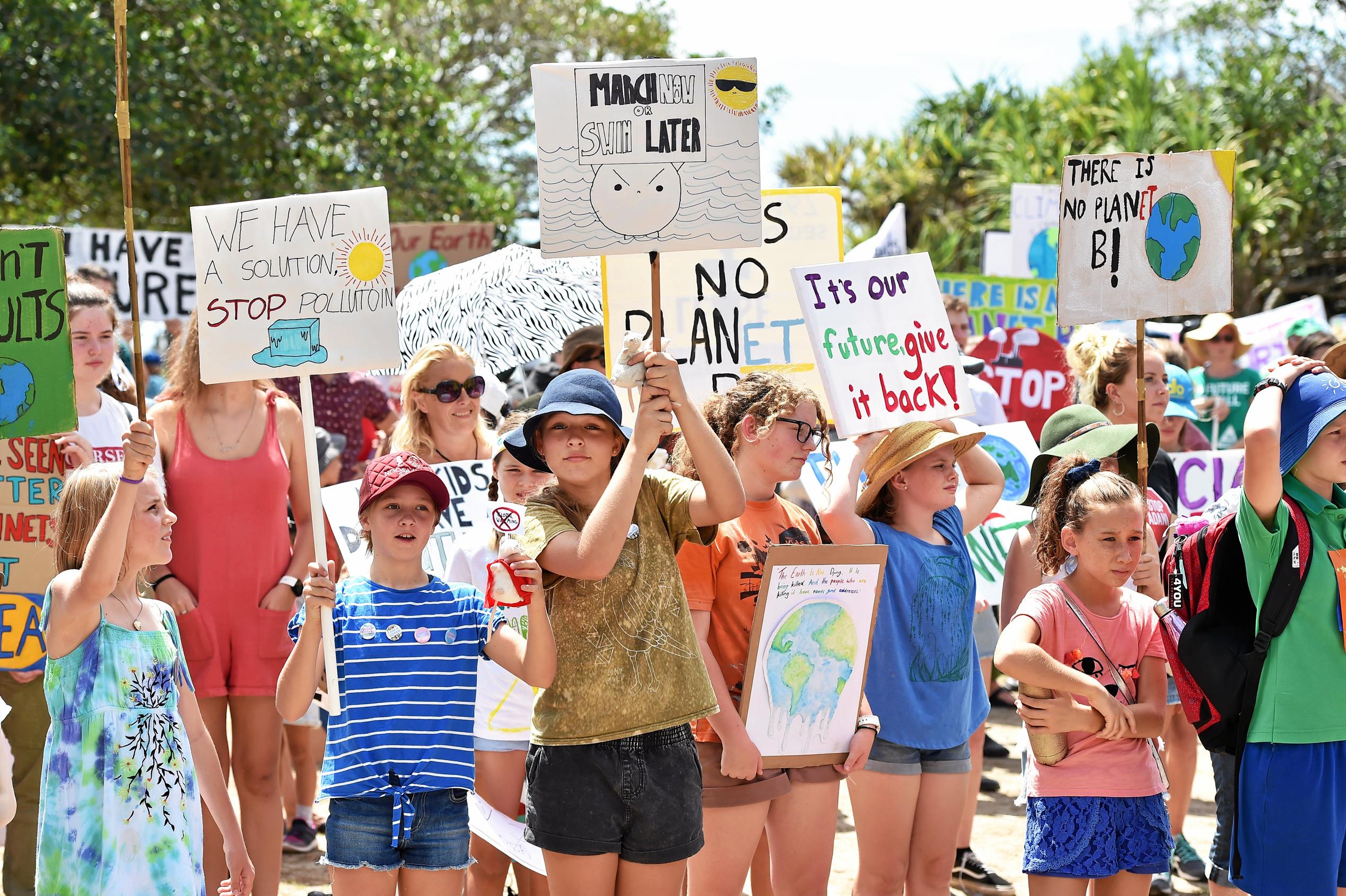 School students and community members gather at Peregain Beach to tell our politicians to take all them seriously and start treating climate change for what it is: a crisis and the biggest threat to our generation and gererations to come. Picture: Patrick Woods