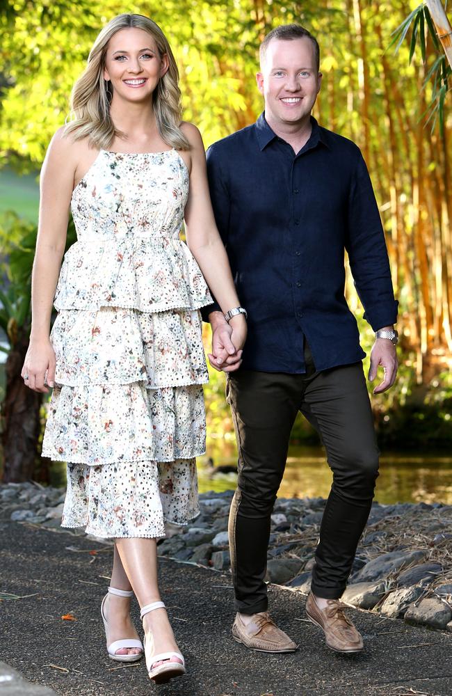 Channel 7 presenter Kendall Gilding and husband Tim Morgan posing in the Mount Coot-tha Botanic Gardens in February after revealing they were expecting their first child. Picture: AAP/Steve Pohlner