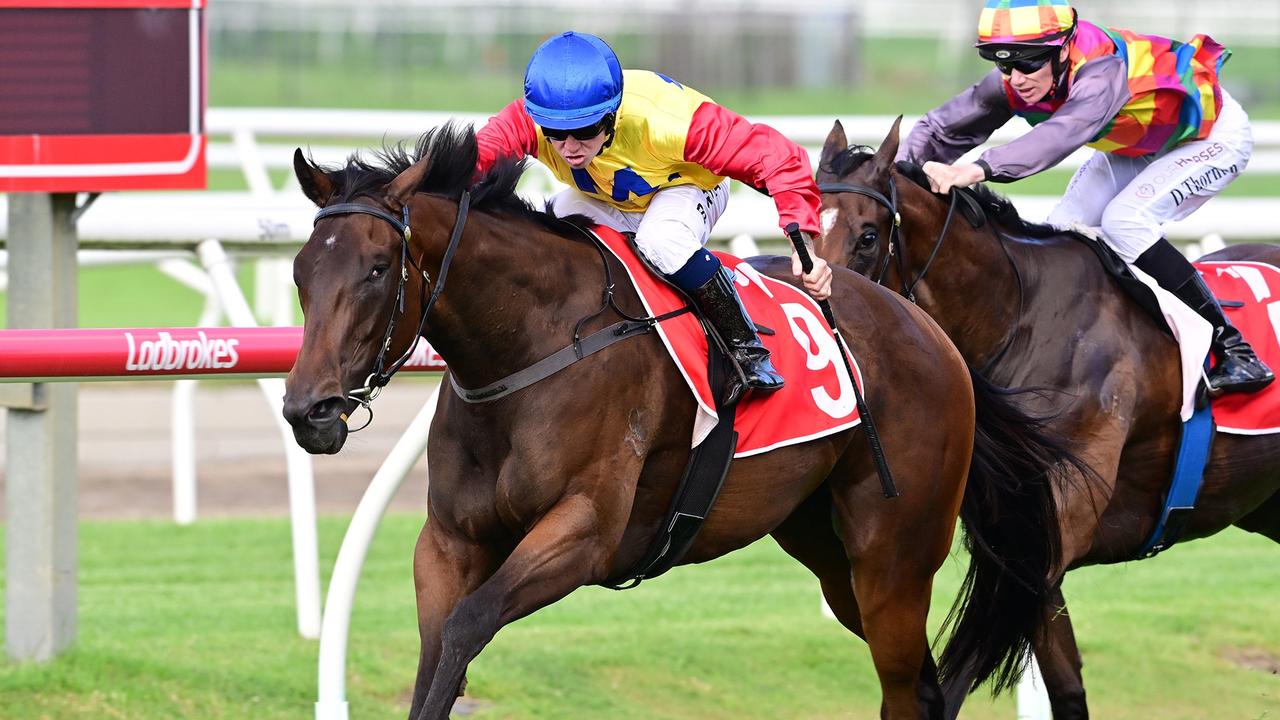 Supplied Editorial West Of Dalby dashes clear under jockey Brock Ryan to win the Mode  Stakes at Doomben. Picture: Grant Peters - Trackside Photography