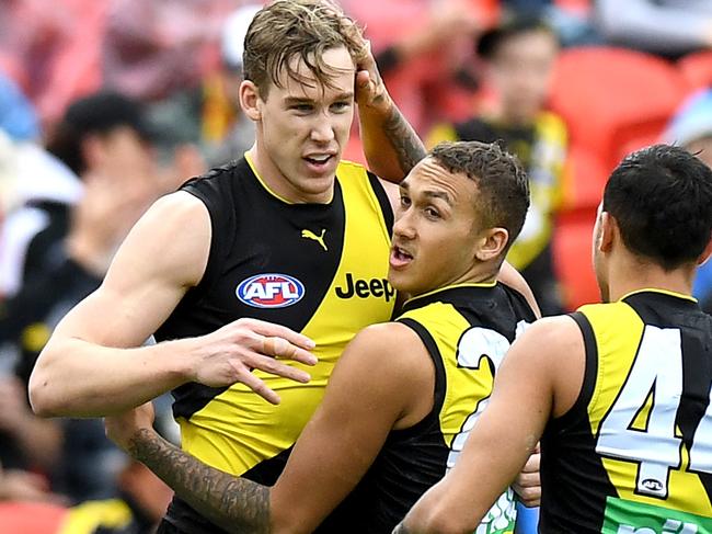 GOLD COAST, AUSTRALIA - JULY 06: Tom Lynch of the Tigers and Shai Bolton celebrate during the round 16 AFL match between the Gold Coast Suns and the Richmond Tigers at Metricon Stadium on July 06, 2019 in Gold Coast, Australia. (Photo by Bradley Kanaris/Getty Images)