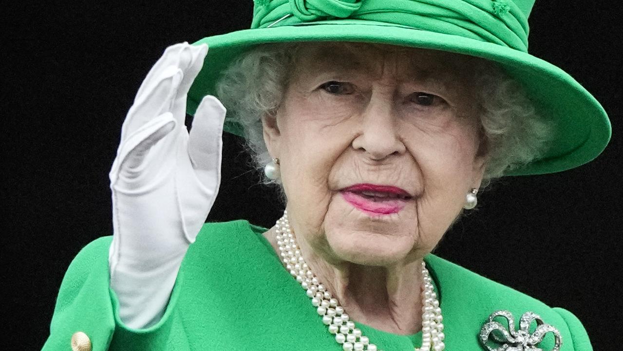 Queen Elizabeth II smiles to the crowd from the Buckingham Palace balcony during her platinum jubilee celebrations in June 2022. Picture: AFP