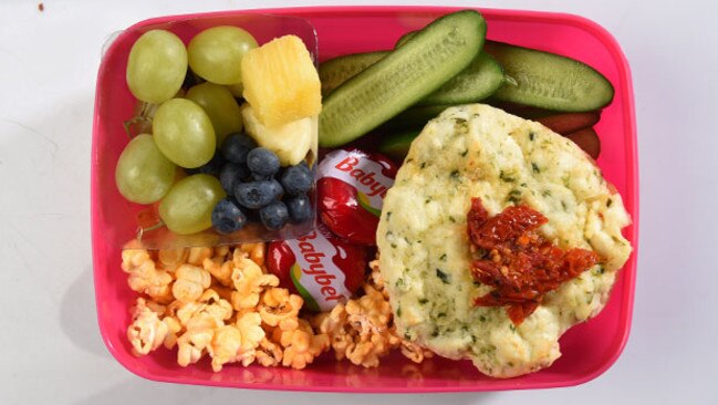 Lunchbox Three: Zucchini, corn and bacon muffins, frozen pineapple, grapes and blueberries, babybel cheese wheels, popcorn.