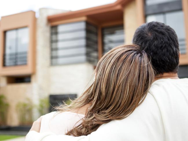 Generic photo of an Australian couple looking at property