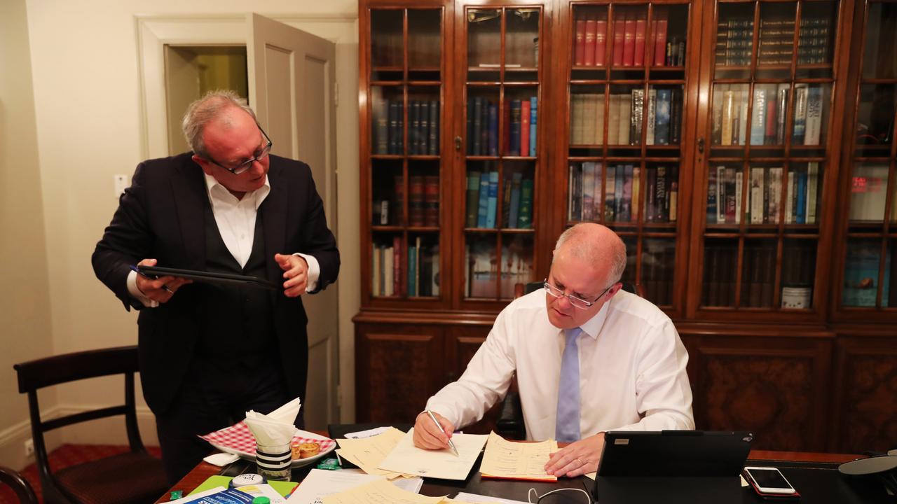 Prime Minister Scott Morrison with Yaron Finkelstein on the night of the election going through the numbers. Picture: Adam Taylor