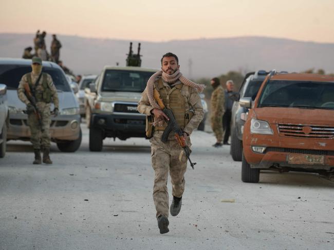 Anti-government fighters reach the highway near the northern Syrian town of Azaz on December 1, 2024. Picture: AFP