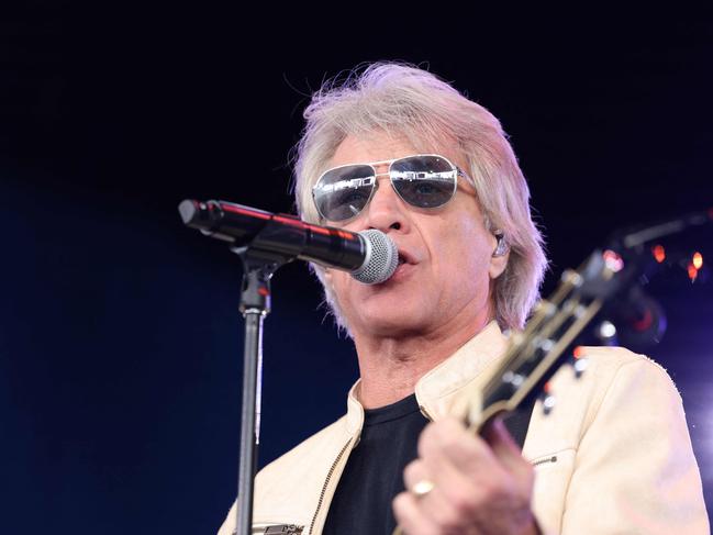 US musician Jon Bon Jovi performs during a campaign rally for US Vice President and Democratic presidential candidate Kamala Harris in Charlotte, North Carolina, on November 2, 2024. (Photo by CHARLY TRIBALLEAU / AFP)