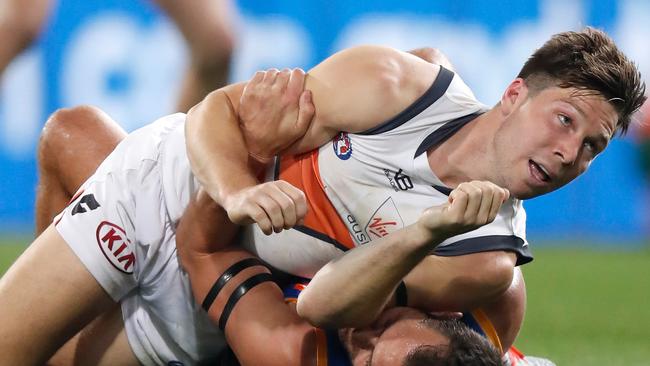 BRISBANE, AUSTRALIA - SEPTEMBER 14: Luke Hodge of the Lions and Toby Greene of the Giants wrestle during the 2019 AFL Second Semi Final match between the Brisbane Lions and the GWS Giants at the Gabba on September 14, 2019 in Brisbane, Australia. (Photo by Michael Willson/AFL Photos via Getty Images)