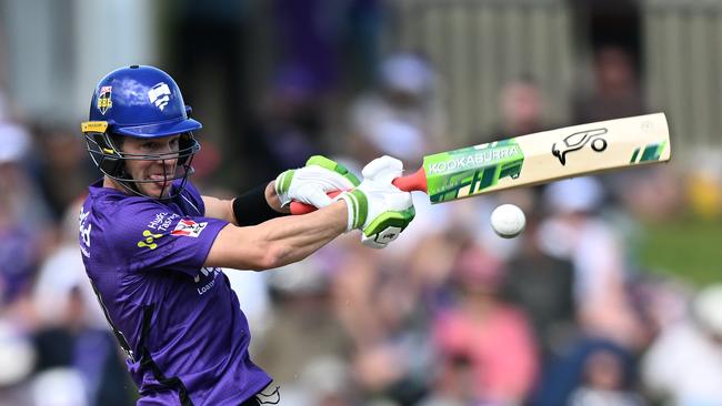 HOBART, AUSTRALIA - DECEMBER 24: Tim Paine of the Hurricanes hits a boundary during the Men's Big Bash League match between the Hobart Hurricanes and the Melbourne Renegades at Blundstone Arena, on December 24, 2022, in Hobart, Australia. (Photo by Steve Bell/Getty Images)