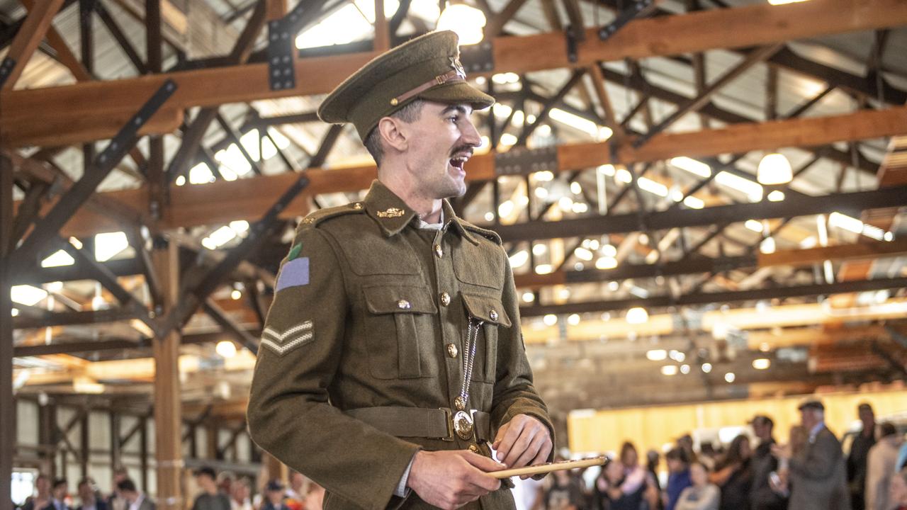 Spencer Smith relishes his chance at being the Spinner in a Two-up game on ANZAC Day in The Goods Shed. Tuesday, April 25, 2023. Picture: Nev Madsen.