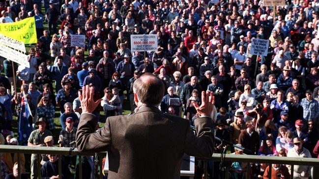 Prime Minister John Howard in 1996 wearing bulletproof vest under his jacket while addressing anti-gun control law demonstration in Victoria. Picture: News Corp