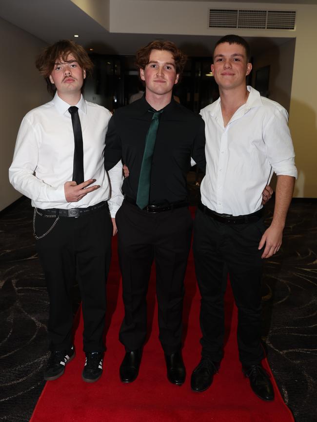 MELBOURNE, AUSTRALIA – JUNE 14 2024 Noah Briggs, John Stephens and Logan Troughton attend the Lowanna College Senior Formal 2024 at the Moe Racing Club Picture: Brendan Beckett