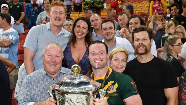 Boyd Cordner poses with family following the Kangaroos' 2017 Rugby League World Cup final win over England. Pictured top left is Cordner's cousin, Joel Dark, who suffered a head knock at Charlestown's St John Oval in Sunday's Real NRL match between Central and Western Suburbs. Picture: Robbie Dolan/NRL Photos