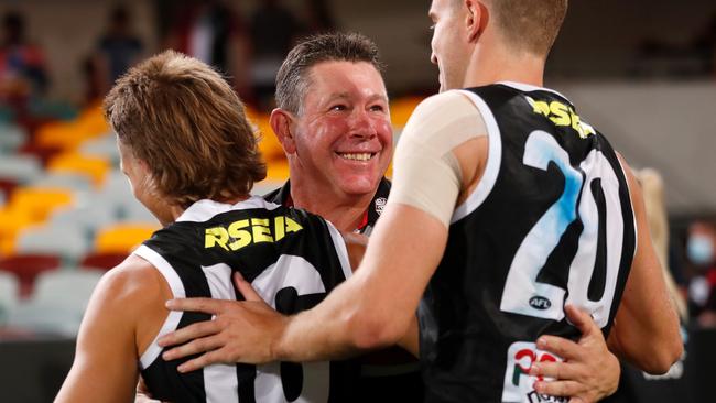 Brett Ratten celebrates St Kilda’s elimination final win over the Western Bulldogs with players Dan Butler and Dougal Howard. Picture: Michael Willson/AFL Photos via Getty Images