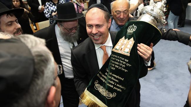 Josh Frydenberg with Jewish community leaders after the signing of the Torah in Parliament House in 2017. Picture Gary Ramage