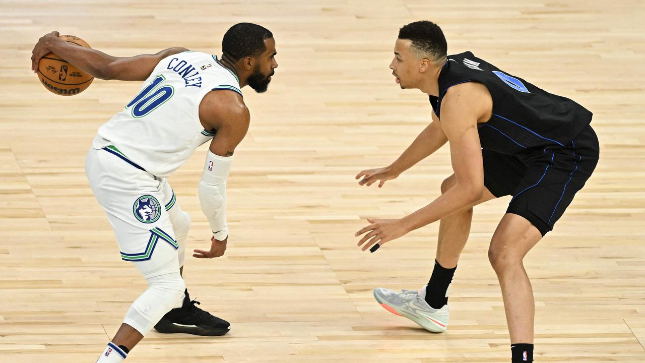 Dante Exum guards Mike Conley in the Western Conference Finals. Stephen Maturen/Getty Images/AFP