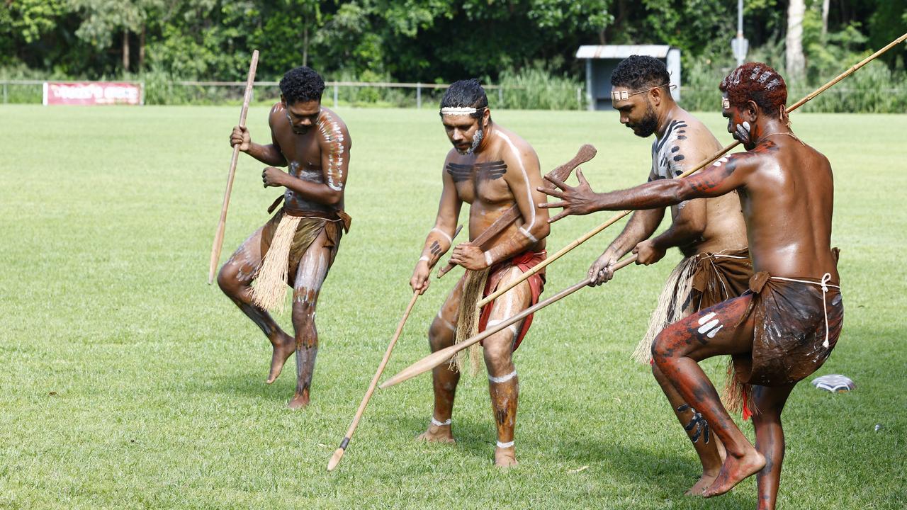 Djabugay dancers Tristan Brim, Alfred Hunter, Levi Newbury and Andrew Duffin perform an indigenous dance at the Little Day Out family day, held at the Holloways Beach Sports Oval and raising funds for the Holloways Hub. Picture: Brendan Radke