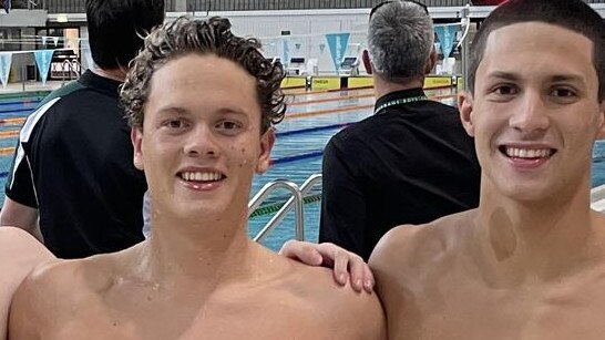 Rackley and Terrace swimmer Ike Martinez, left.