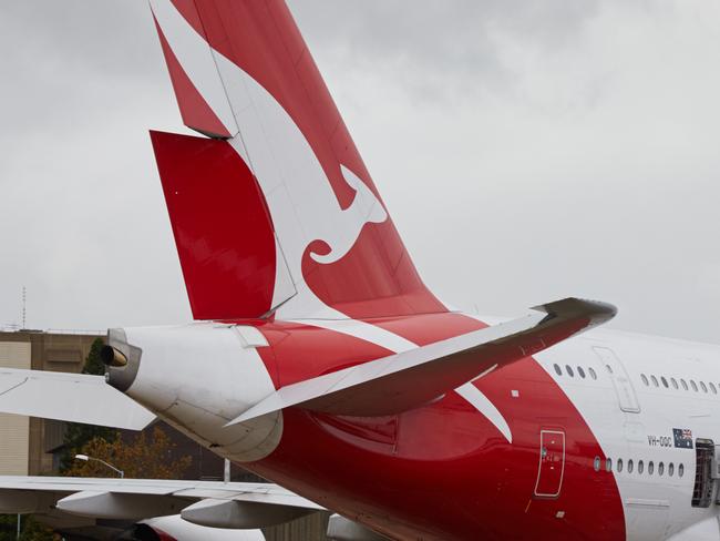 A Qantas plane is seen at Sydney Airport in Sydney, Friday, June 1, 2018. (AAP Image/Erik Anderson) NO ARCHIVING