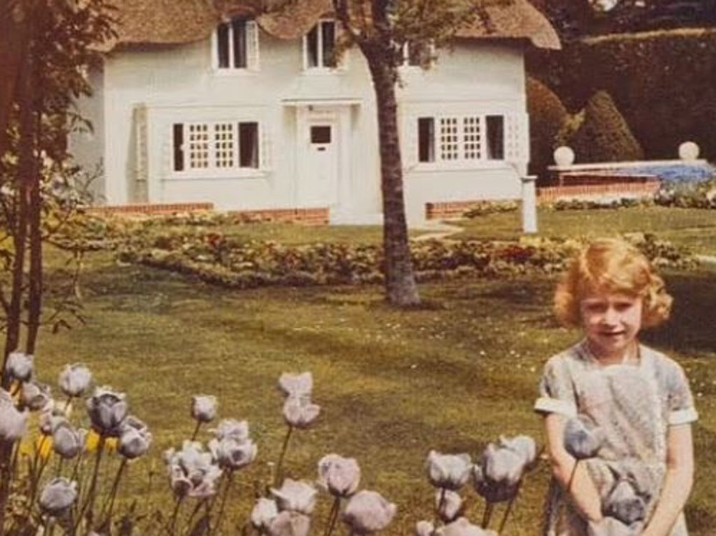 Princess Elizabeth outside the cottage in June 1936, when she was 10. Picture: Getty Images