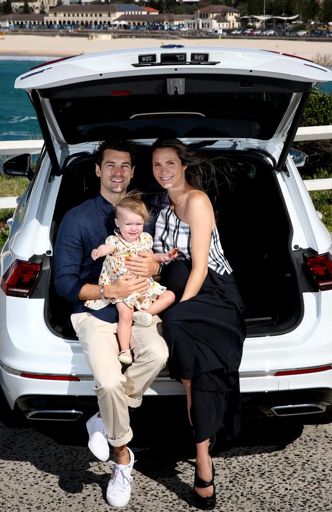 Matty J and Laura Byrne with daughter Marlie-Mae and their Volkswagon Tiguan at Bondi. Picture: Toby Zerna