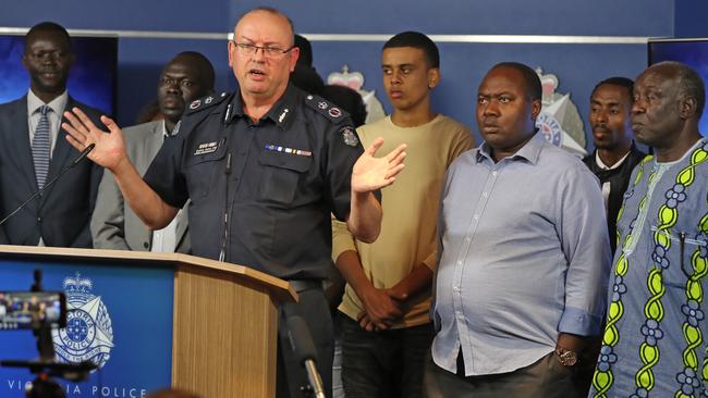 Chief Commissioner Graham Ashton with the taskforce comprising of African community leaders. Picture: Alex Coppel