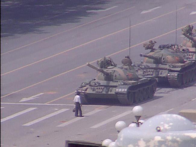 Footage filmed from the balcony of a Beijing Hotel room, showing a man approaching a convoy of tanks in Tiananmen Square, on June 5, 1989. ABC News cameraman Willie Phua captured one of the most influential images in history: Tank Man. Picture: ABC News Australia / Willie Phua